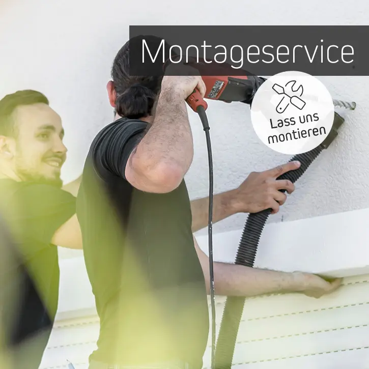 Zwei Personen bei der Montage eines Objekts an einer Wand mit Werkzeugen