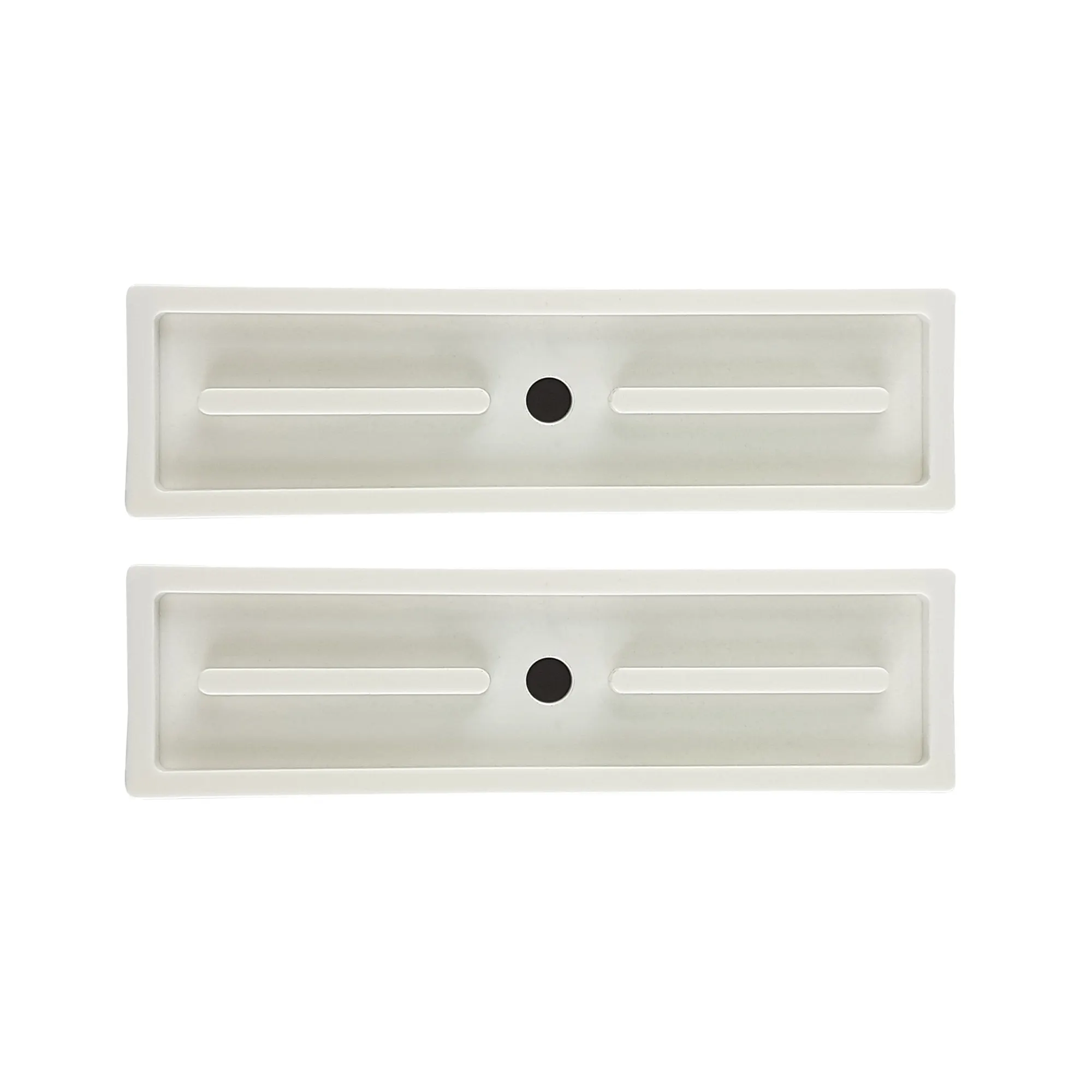 Due tappi rettangolari con foro centrale per guide di avvolgibili