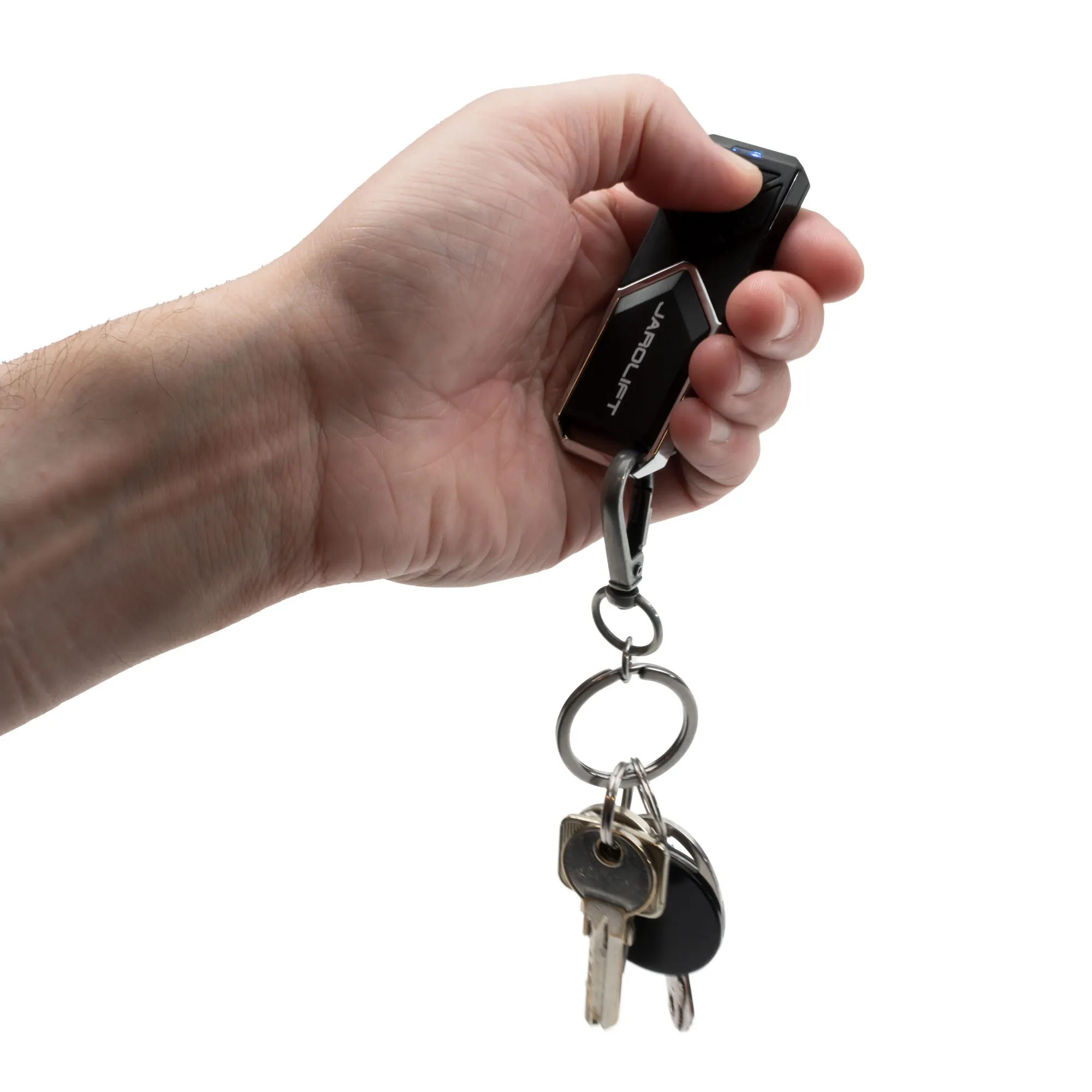 Mano che tiene un trasmettitore radio a 4 canali con portachiavi per apertura garage