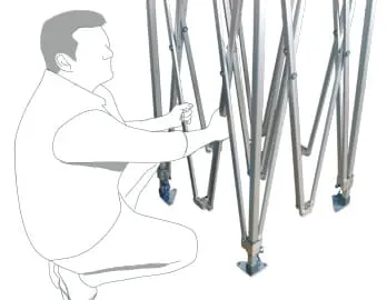 Person montiert Faltpavillon PRO, zeigt Gestell und Aufbauprozess