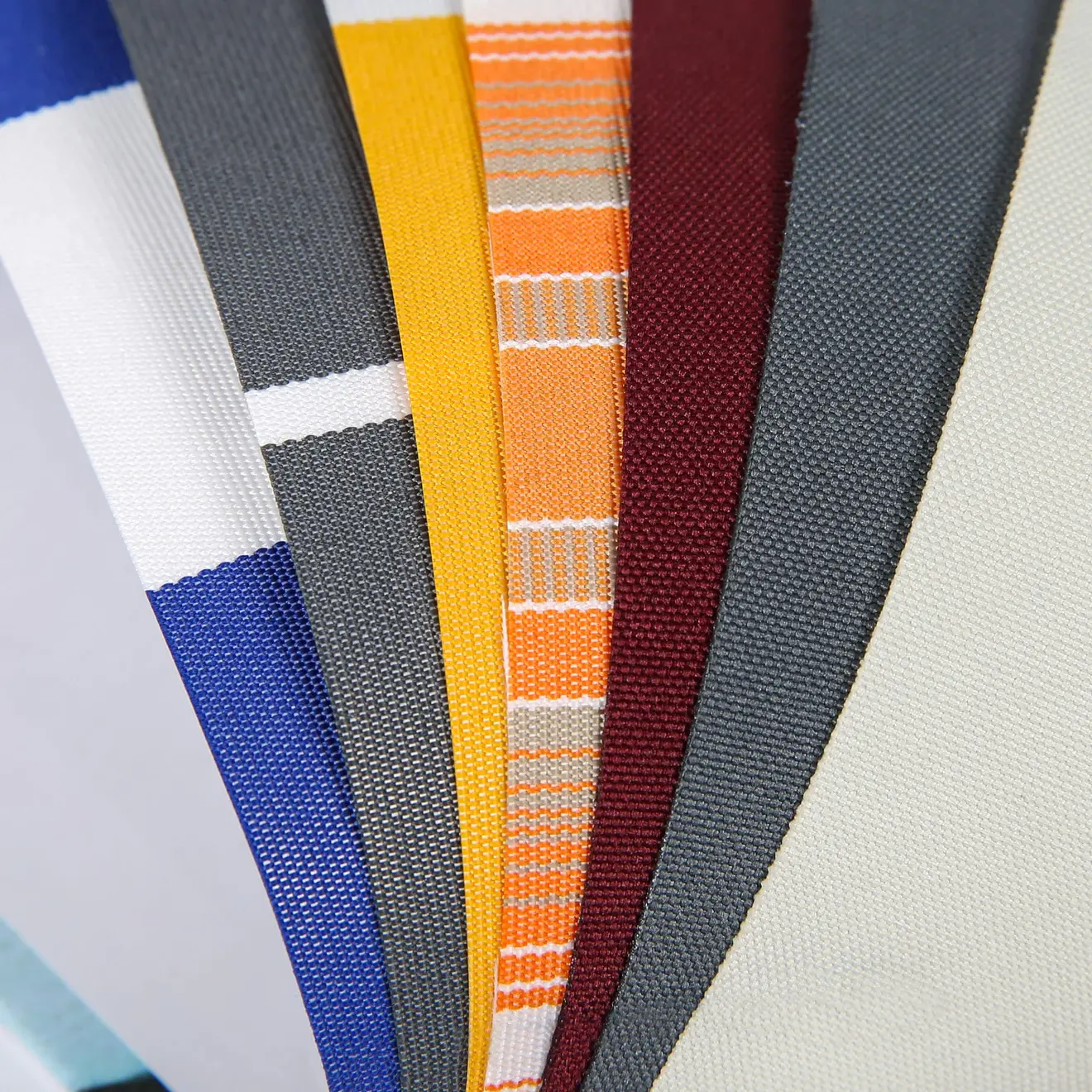 Stoffmusterkollektion für Gelenkarmmarkise Basic 2000, verschiedene Texturen und Designs